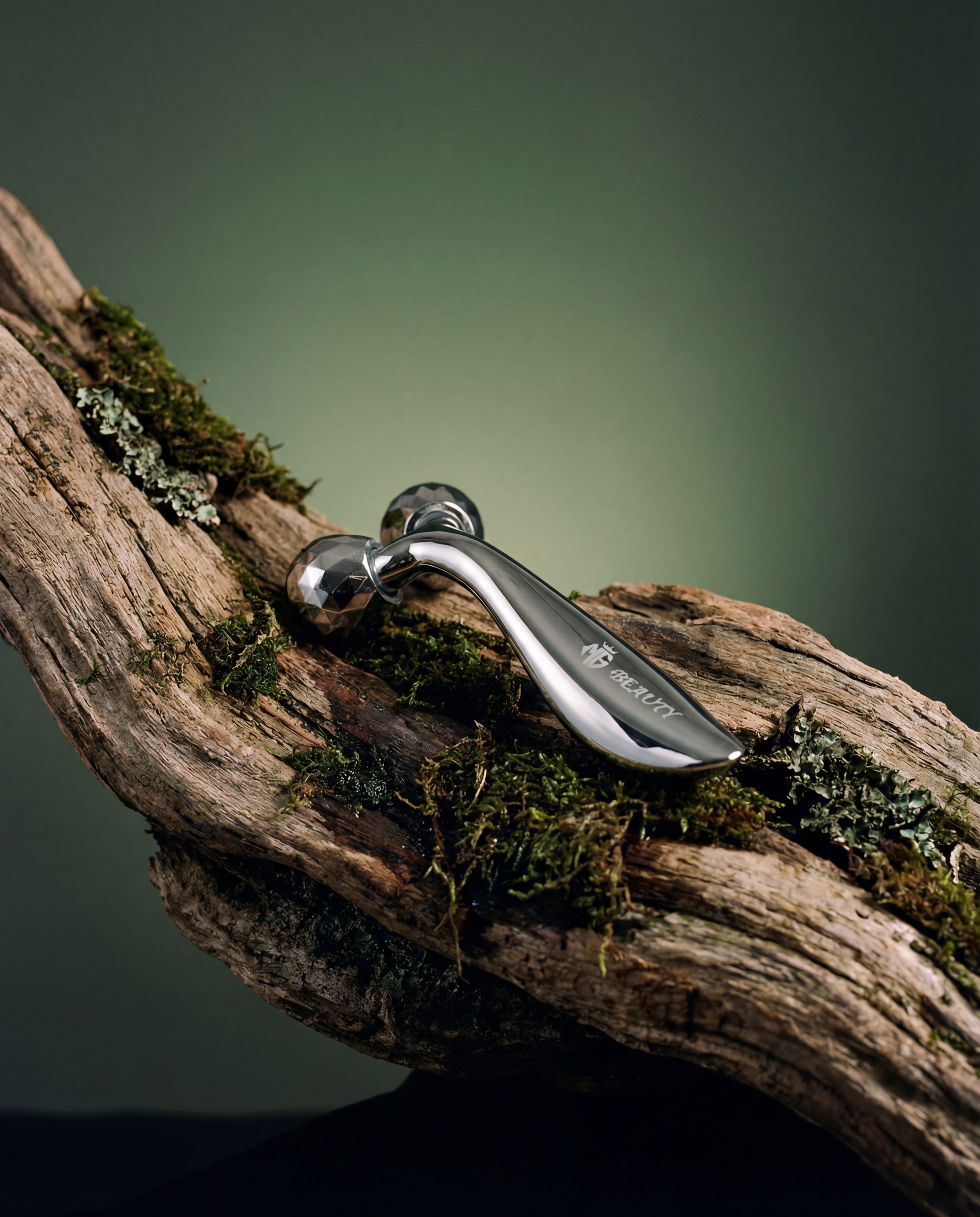 Microcurrent 3D face roller V-shape slimming tool on mossy wood