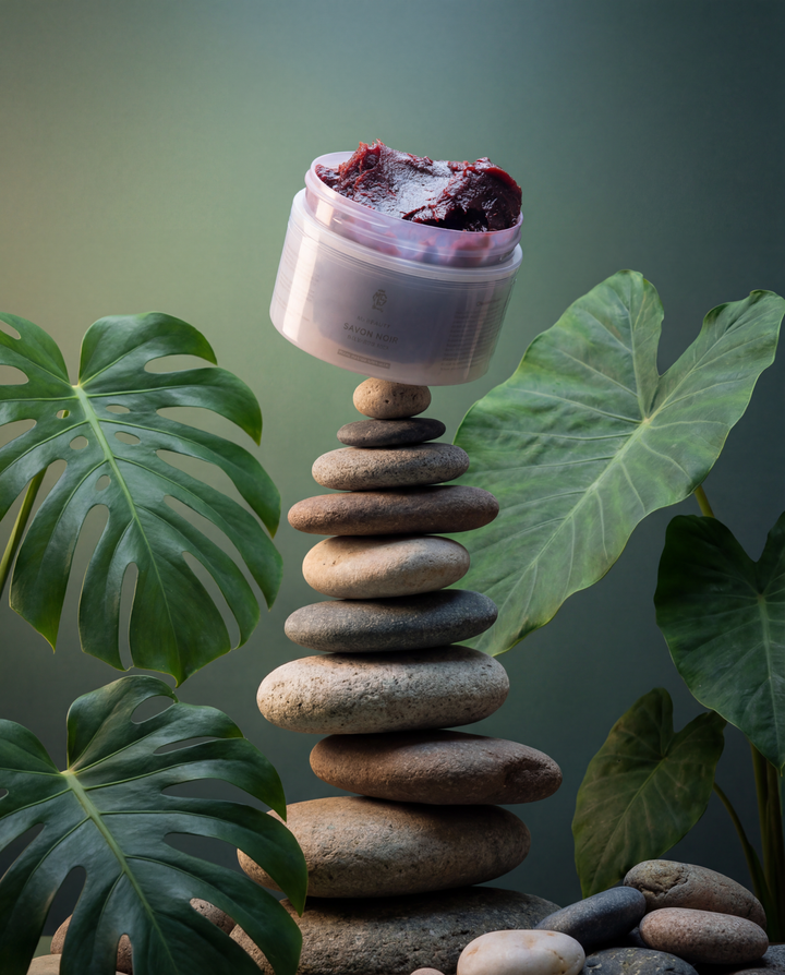 Moroccan black soap with aker fassi, the traditional rose and pomegranate bark preparation, in a glass jar